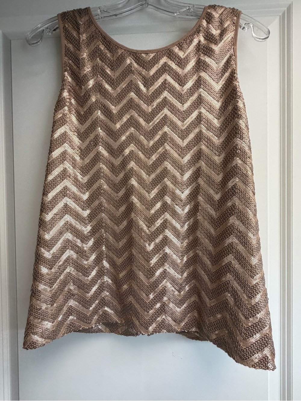 Bebe sequin tank top features a champagne gold chevron pattern